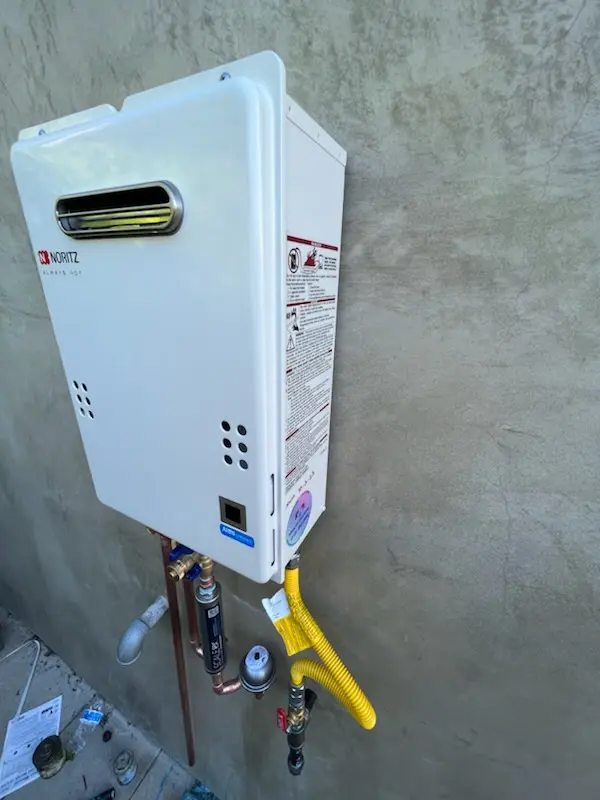 Tankless water heater installation for Green Manor Village homes